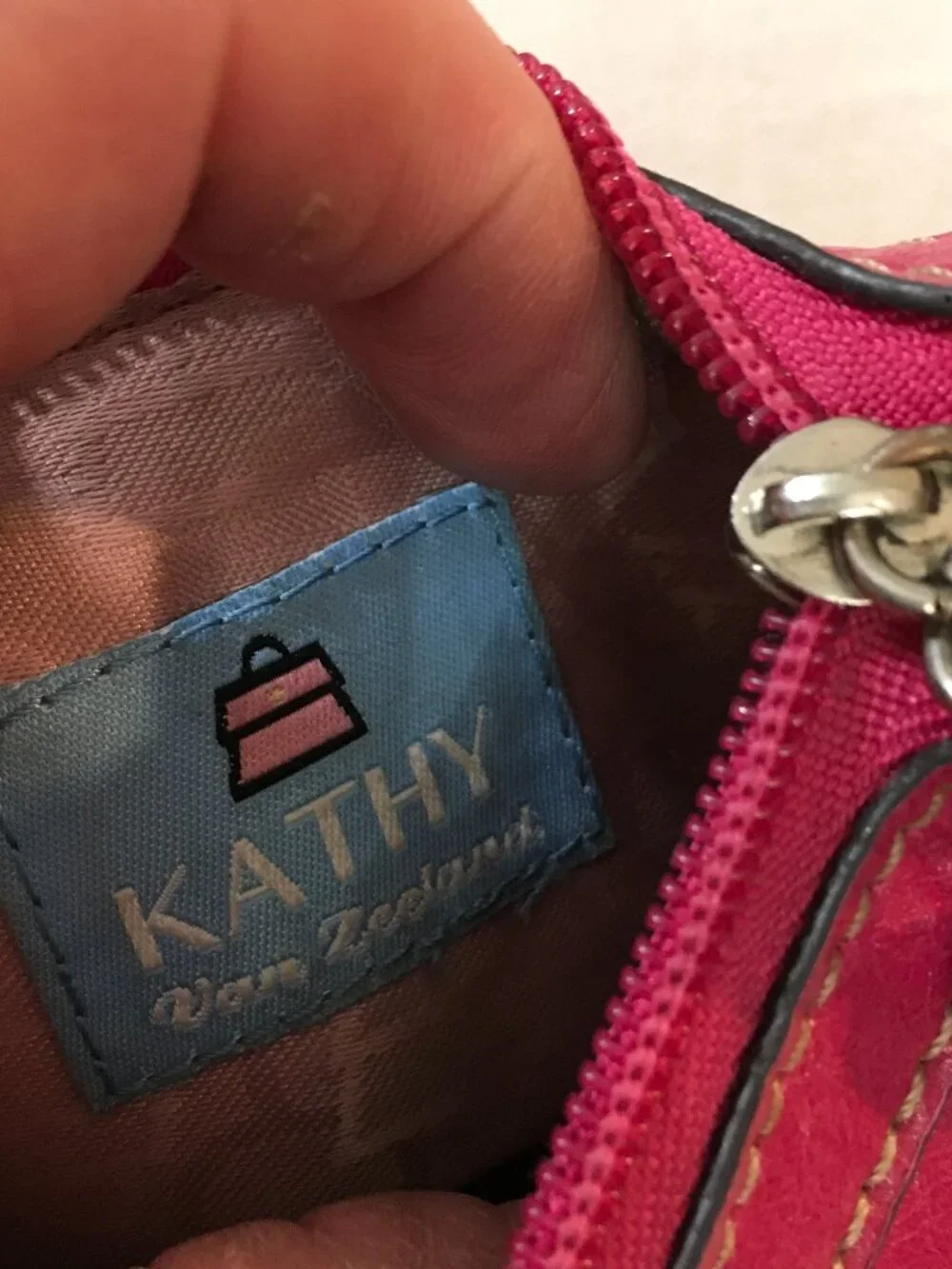 Kathy Van Zeeland Pink Crossbody bag Logo Plaque Chain Accent Strap